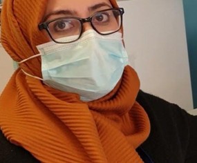 a scientist in a facemask